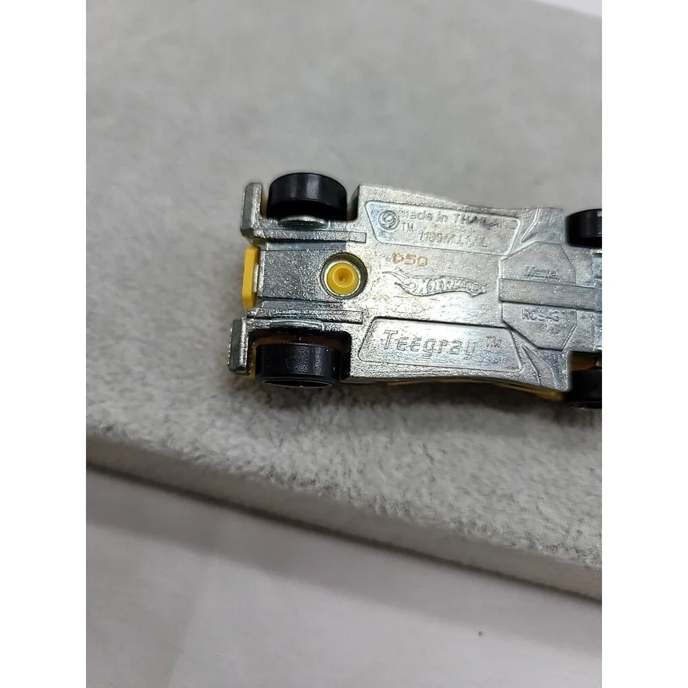 Hot Wheels Teegray Yellow Exotic Sports Car with Chrome Wheels 1:64